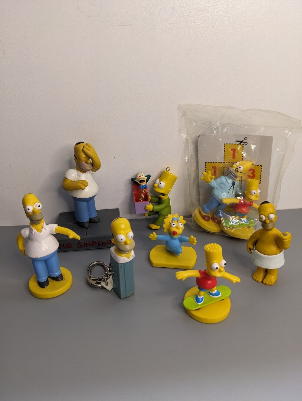 Simpsons Figurine Variant Bundle Nine Piece Set With Homer Bart Grampa And Maggi
